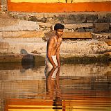 Morning bathe in the temple holy water