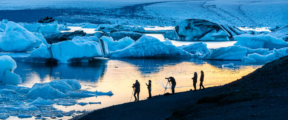 Photographers at the Jökulsárlón glacier lagoon
