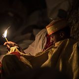 Deacon with candle, Lalibela