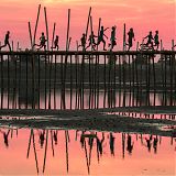 children running across bridge