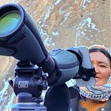 Mangju village woman checking out Snow Leopard
