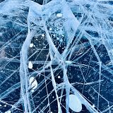 Ice patterns in the frozen lake
