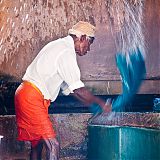 Man working in Cochin washouse, Kerala, South India
