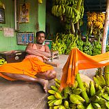 Trader relaxing, Madurai banana market, Tamil Nadu, South India